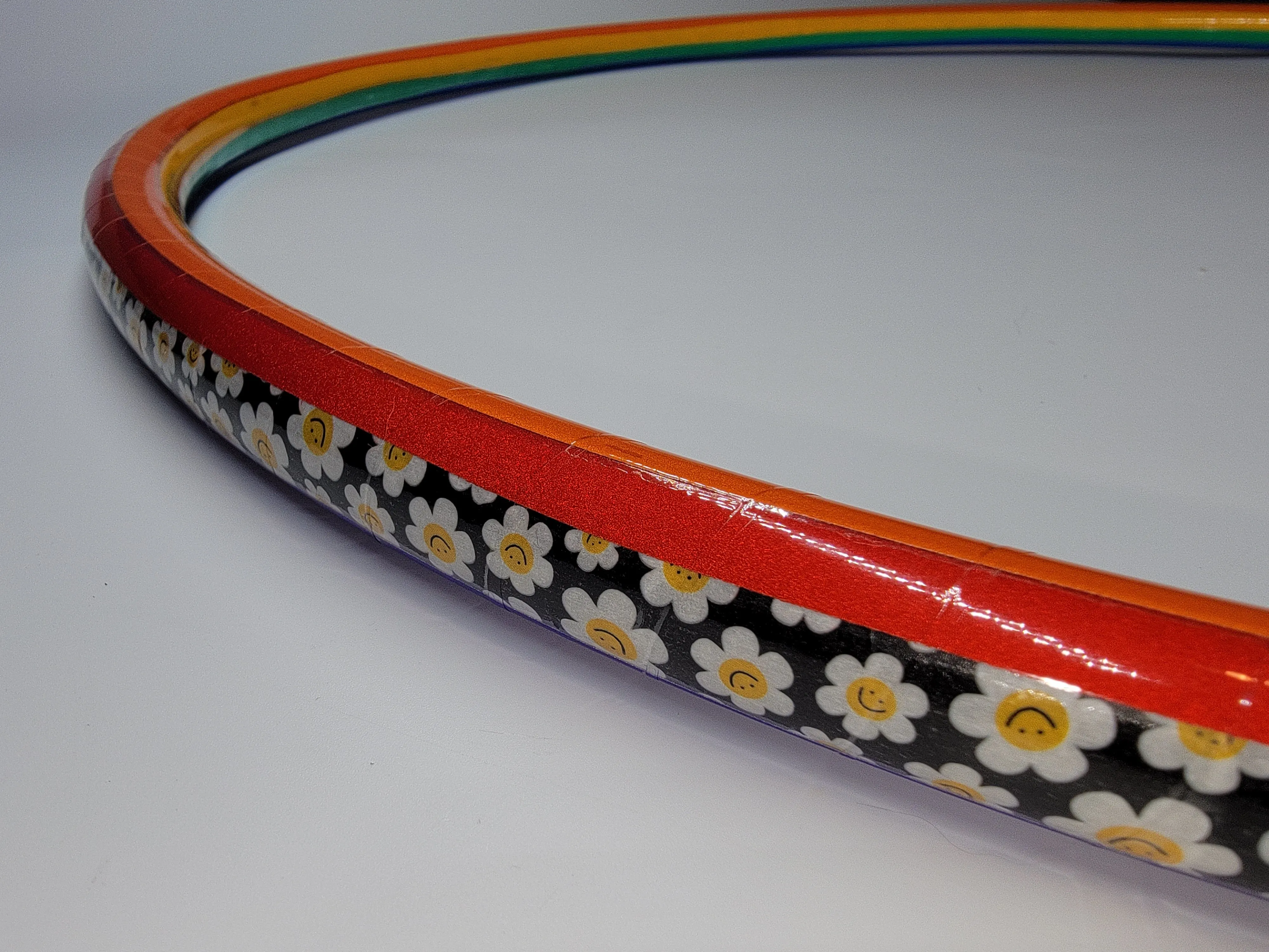 Electric Daisy Rainbow Coinflip Specialty Reflective Taped Hoop